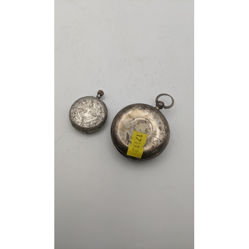 136 - A 19th century silver open faced pocket watch together with an early 20th century 935 silver fob wat... 