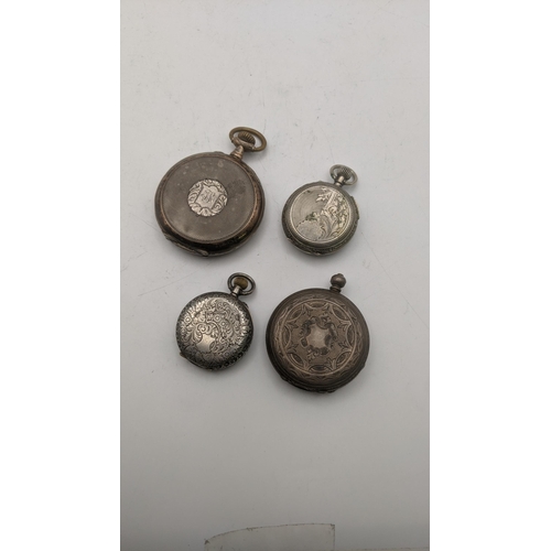 138 - An early 20th century silver open faced keyless wound pocket watch together with three fob watches
L... 