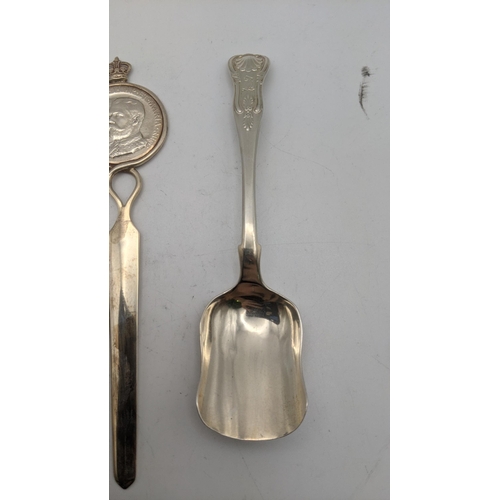 146 - Silver utensils to include a sauce ladle, sugar scoop, sugar sifter and one other together with a le... 