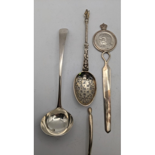 146 - Silver utensils to include a sauce ladle, sugar scoop, sugar sifter and one other together with a le... 