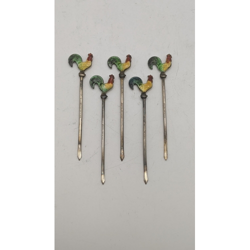 151 - A set of five sterling silver and enamel cocktail sticks
Location: CAB 4
If there is no condition re... 