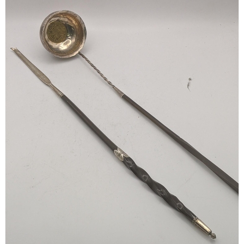 155 - A silver toddy ladle together with a toddy ladle handle
Location: A3B
If there is no condition repor... 