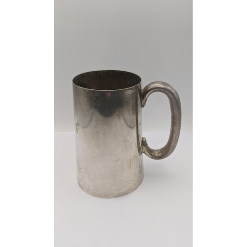 16 - A silver pint tankard initialled hallmarked Sheffield 1943, 346g Location: r1.1
If there is no condi... 