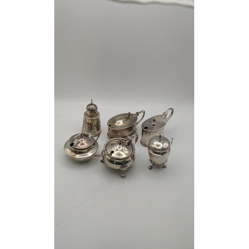 161 - Two silver three piece condiment sets, one set hallmarked Sheffield 1937, and the other hallmarked B... 