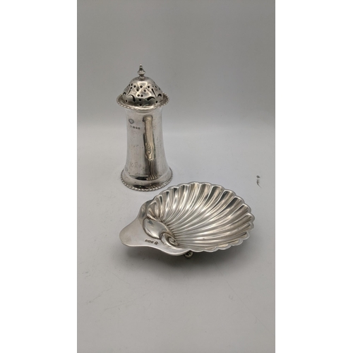 164 - Silver to include a butter dish fashioned as a seashell, together with a sugar caster, total weight ... 