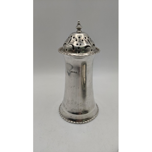 164 - Silver to include a butter dish fashioned as a seashell, together with a sugar caster, total weight ... 