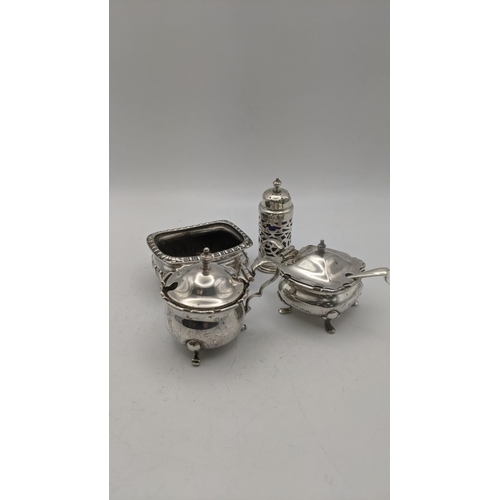 165 - Silver condiments to include two mustard pots, a pepper pot and a salts total weight total weight ex... 