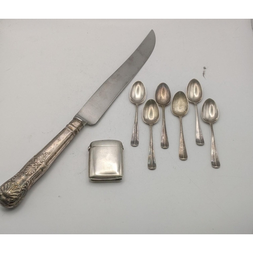 166 - Silver to include a Vesta hallmarked Birmingham 1918, together with a set of teaspoons and a knife, ... 