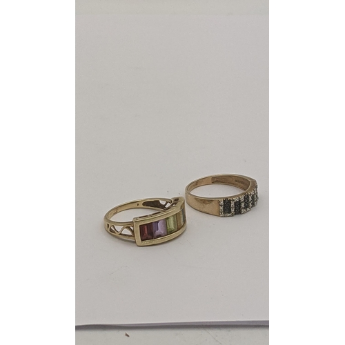 20 - Three ladies rings to include a 14ct multi coloured stone ring 3.2g, a 9ct ring 2.4g
Location: CAB 3... 