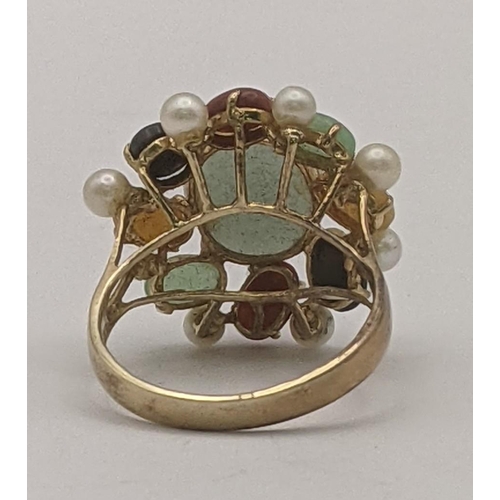 21 - A 14ct gold jade coloured cabochon cluster ring 6g
Location: CAB 3
If there is no condition report s... 