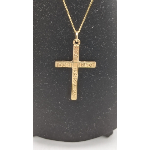 26 - Gold to include a 15ct necklace 2.4g together with two 9ct gold pendants, one fashioned as a crucifi... 