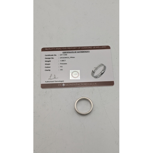 30 - A platinum and diamond eternity ring 7.2g size L½ with Certificate of Authenticity 
Location: CAB 6
... 