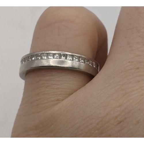 30 - A platinum and diamond eternity ring 7.2g size L½ with Certificate of Authenticity 
Location: CAB 6
... 