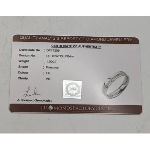 30 - A platinum and diamond eternity ring 7.2g size L½ with Certificate of Authenticity 
Location: CAB 6
... 