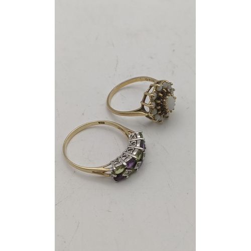 39 - Two 9ct gold rings, one set with opals, the other coloured stones, 5.5g
Location: CAB 3
If there is ... 