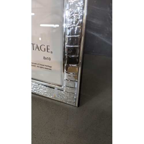 51 - A Drexel Heritage silver photo frame 8 x 10
Location: 5-4
If there is no condition report shown, ple... 