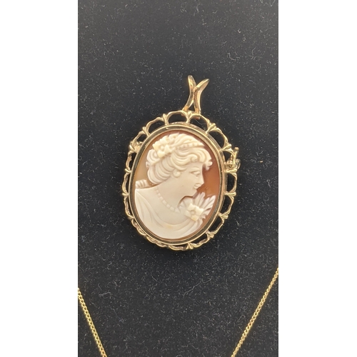 52 - A 9ct gold necklace with a diamond pendant, 1.45g and a 9ct gold framed cameo brooch
Location: CAB 2... 