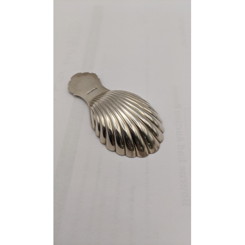 53 - A Broadway and co silver tea caddy spoon fashioned as a seashell hallmarked Birmingham 1997 20.8g
Lo... 