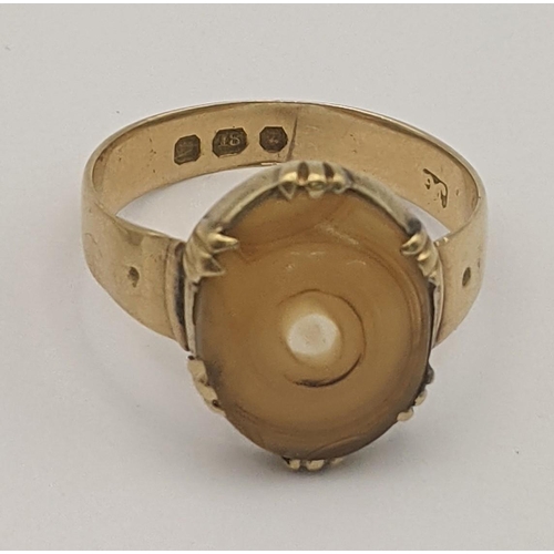 6 - Two ladies gold rings to include an 18ct gold an agate in a claw setting 3.3g together with a 9ct go... 