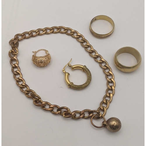 65 - Gold coloured jewellery to include a large flat curb link bracelet, a thick gauge ring and another a... 