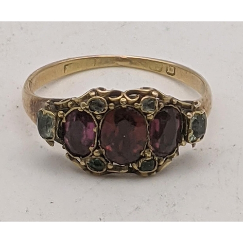 67 - A yellow gold Victorian garnet and green stone ring tested as 15ct gold size Q½ 3.1g
Location: CAB 3... 