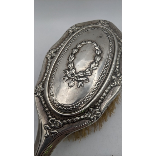 70 - A silver embossed dressing table set hallmarked Birmingham 1907
Location: R2.3
If there is no locati... 