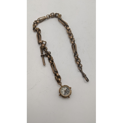 75 - A gold plated Albert watch chain together with a 9ct gold bulldog clip and a 9ct gold Fob/compass se... 