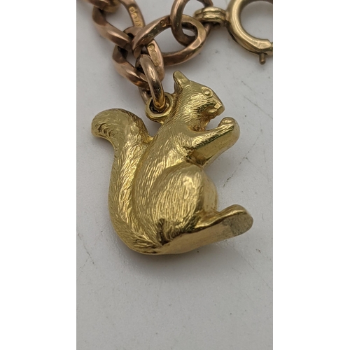 76 - A 9ct gold bracelet having a yellow squirrel tested as 18ct and a later clasp total weight 12.3g
Loc... 