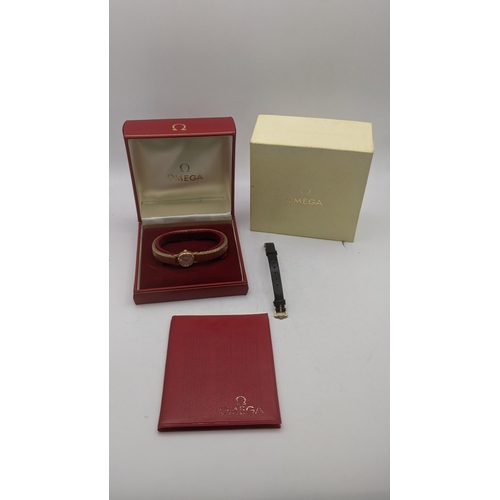 84 - A 9ct gold ladies Omega manual wind wrist watch with its box and paperwork
Location: CAB
If there is... 