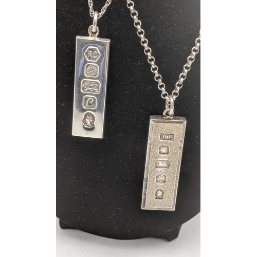 87 - 4 silver ingot pendants two on silver necklaces together with a white metal Egyptian Cartouche total... 