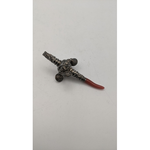 94 - A white metal and coral baby's rattle and whistle
Location: CAB 2
If there is no condition report sh... 