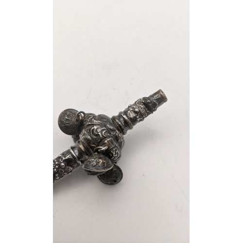 94 - A white metal and coral baby's rattle and whistle
Location: CAB 2
If there is no condition report sh... 