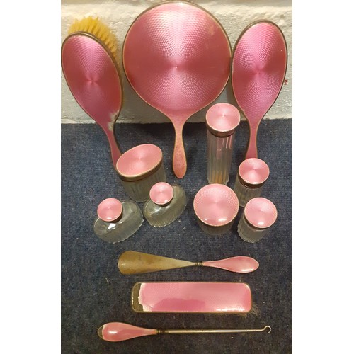 49 - An Edwardian 13 piece silver, white metal and pink enamelled dressing table set to include 3 brushes... 