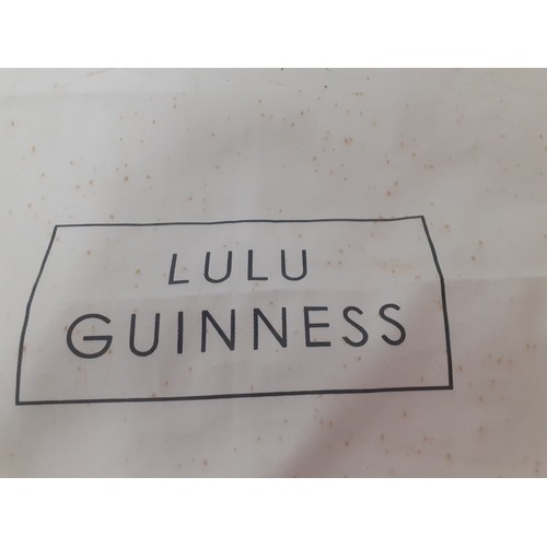 10 - Lulu Guinness- A large black patent handbag 40cm wide x 30cm high having silver tone hardware and re... 