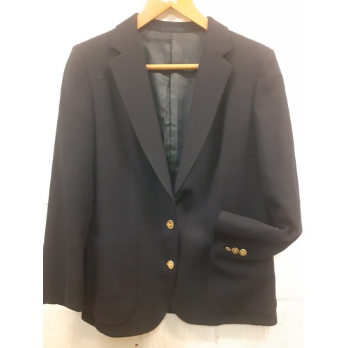 11 - Burberrys- A ladies navy blazer with 2 gold coloured crested buttons to the front and 3 to each cuff... 