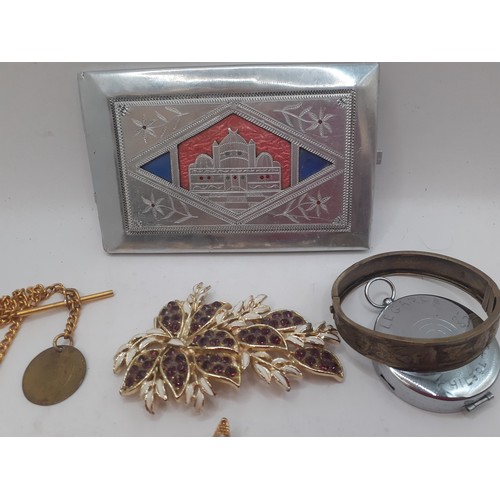 56 - A small quantity of costume jewellery and collectables to include a gold tone pocket watch, a rosary... 