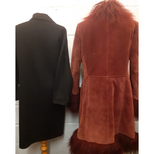 58 - Two modern ladies coats comprising a Ming burgundy suede coat with a fur effect woollen collar, cuff... 