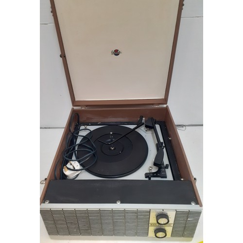 149 - Three vintage record players comprising a PYE Cambridge housed in a briefcase style case, a Master R... 