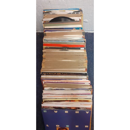 152 - A quantity of 1970's and 80's 45rpm singles to include Meat Loaf, Queen, Madness, Rod Stewart and Bi... 