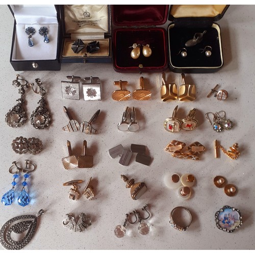 66 - A quantity of Victorian and later costume jewellery and cufflinks to include earrings, silver cuffli... 