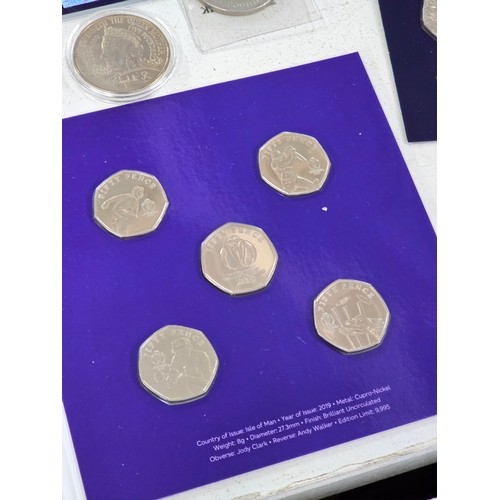 440 - A collection of coin sets to include 2019 Paddington at St Pauls and The Tower presentation packs, 2... 