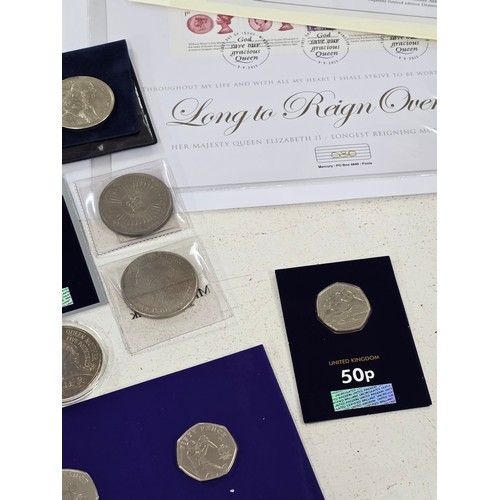 440 - A collection of coin sets to include 2019 Paddington at St Pauls and The Tower presentation packs, 2... 