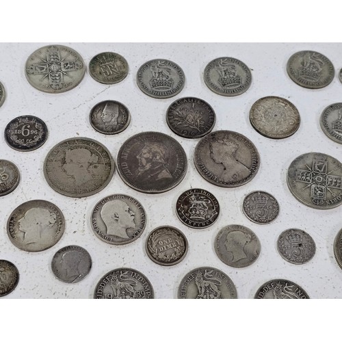 442 - A collection of Silver Coinage to include 1859 'Gothic' Florin, South Africa 1896 2.5 Shillings, 188... 