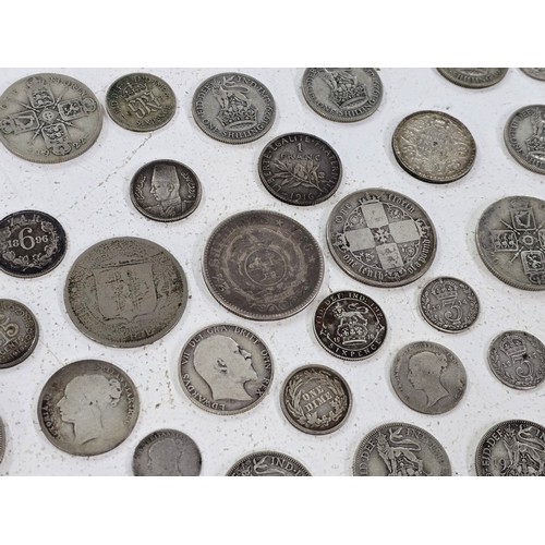 442 - A collection of Silver Coinage to include 1859 'Gothic' Florin, South Africa 1896 2.5 Shillings, 188... 