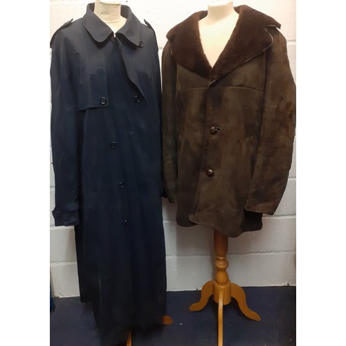 453 - Three late 20th Century gents coats comprising a Rainman of London navy full length rain mac size 44... 