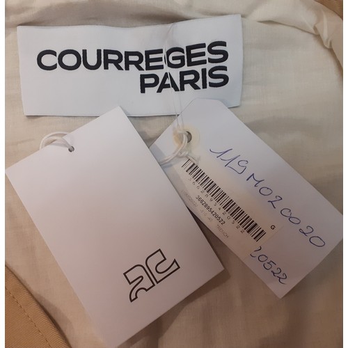 29 - Courreges of Paris-An unused beige 'Manteau' trench coat, approx 46