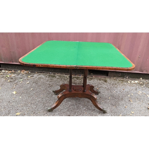 166 - A Regency rosewood card table, having string inlaid top, green playing baize, gilt metal mounts and ... 