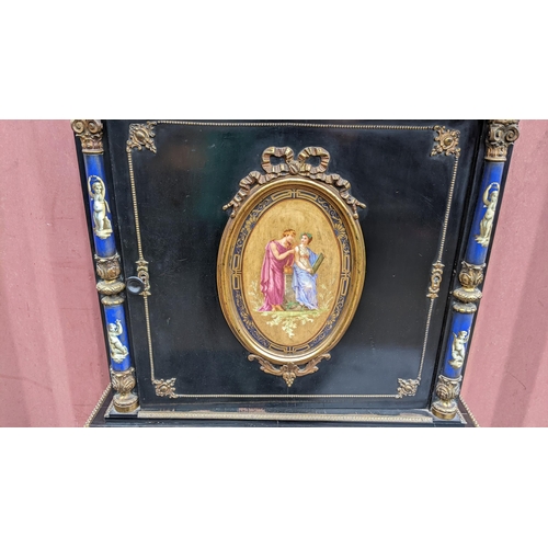 168 - A Napoleon III ebonised and ormolu mounted lady