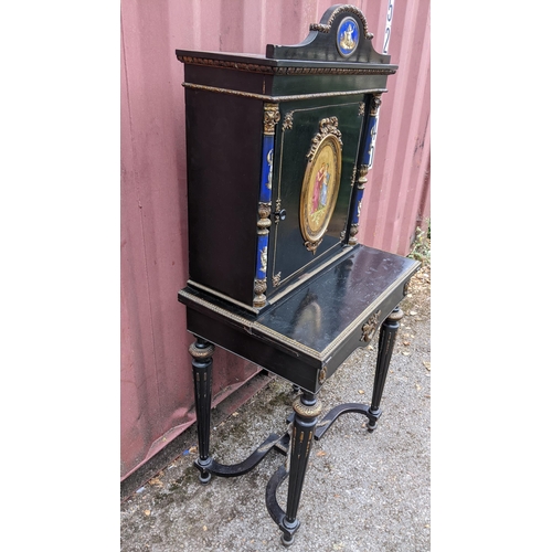 168 - A Napoleon III ebonised and ormolu mounted lady