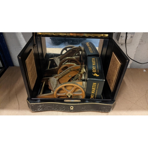 256 - Remy Martin presentation cabinet with cannon holder and glasses,  Location: R3
If there is no condit... 